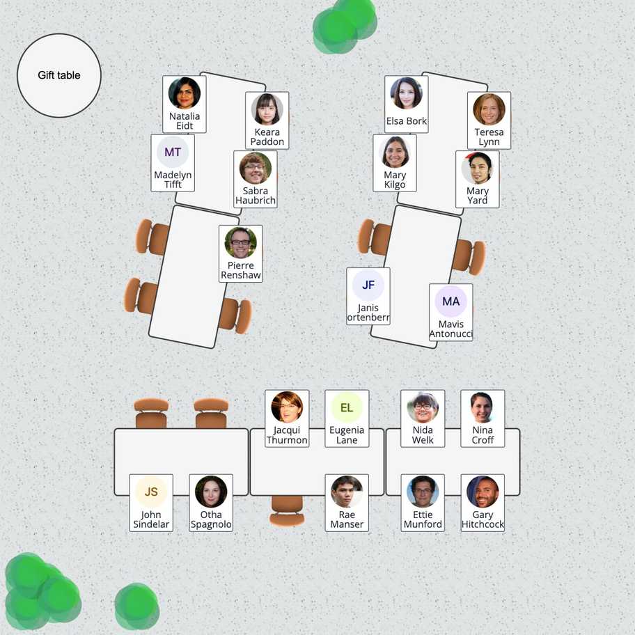 A wedding or event seating chart with long tables, name labels with portraits, and decoration elements like flowers and candles.